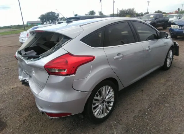 Photo 3 VIN: 1FADP3N28GL340567 - FORD FOCUS 