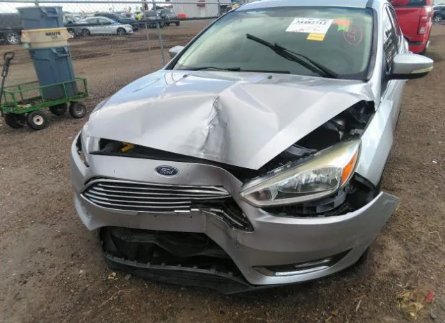 Photo 5 VIN: 1FADP3N28GL340567 - FORD FOCUS 