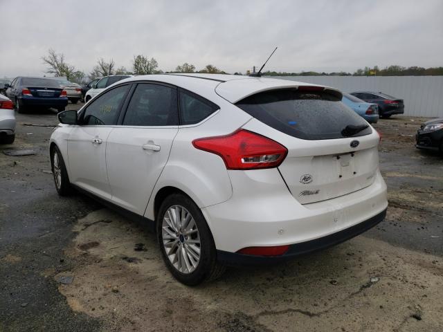 Photo 2 VIN: 1FADP3N28HL309661 - FORD FOCUS 