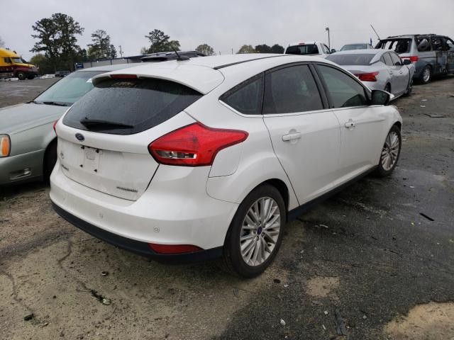 Photo 3 VIN: 1FADP3N28HL309661 - FORD FOCUS 