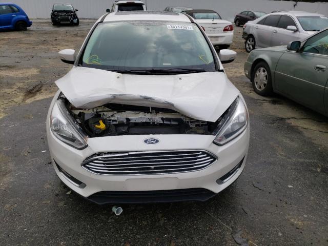 Photo 8 VIN: 1FADP3N28HL309661 - FORD FOCUS 