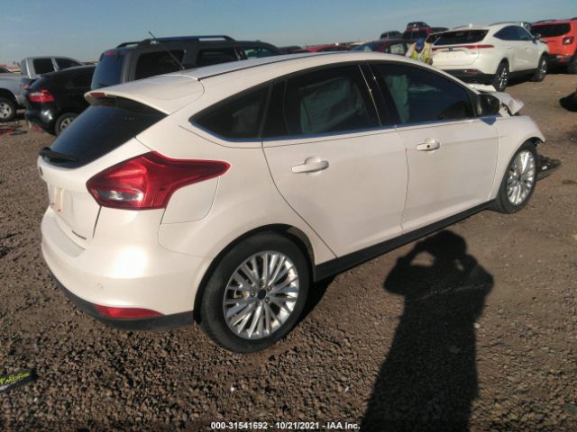 Photo 3 VIN: 1FADP3N29HL222366 - FORD FOCUS 