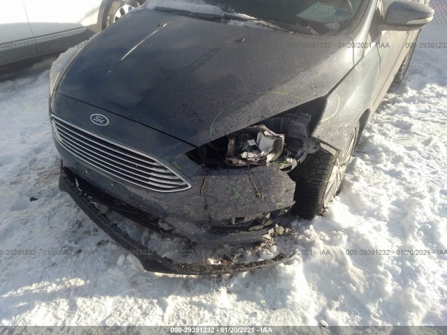 Photo 5 VIN: 1FADP3N29JL271735 - FORD FOCUS 