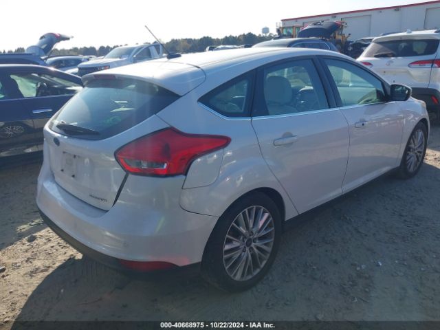 Photo 3 VIN: 1FADP3N29JL331660 - FORD FOCUS 