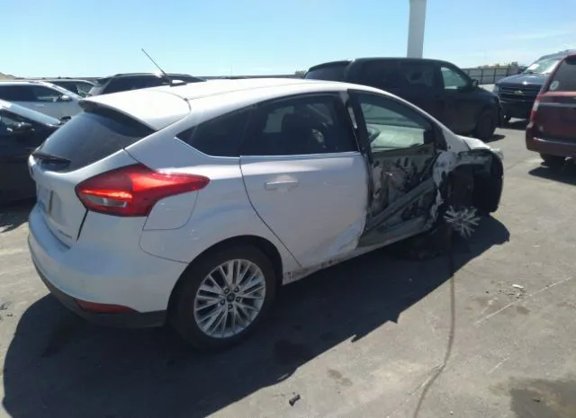 Photo 3 VIN: 1FADP3N2XJL254183 - FORD FOCUS 