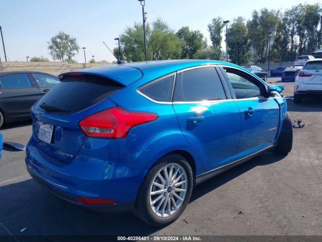 Photo 3 VIN: 1FADP3R40GL344284 - FORD FOCUS 