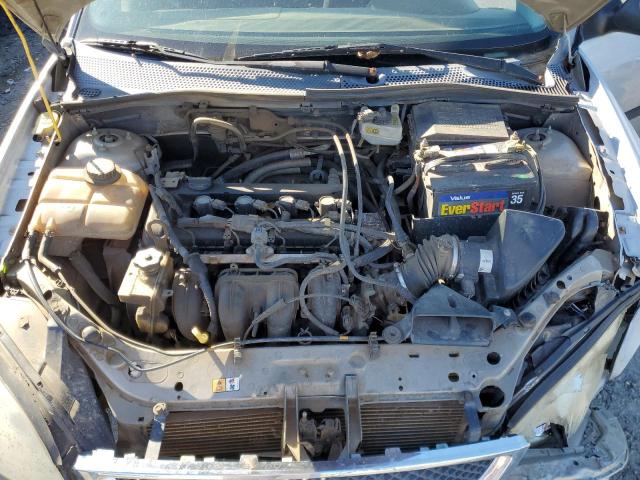 Photo 10 VIN: 1FAFP31N17W334939 - FORD FOCUS ZX3 