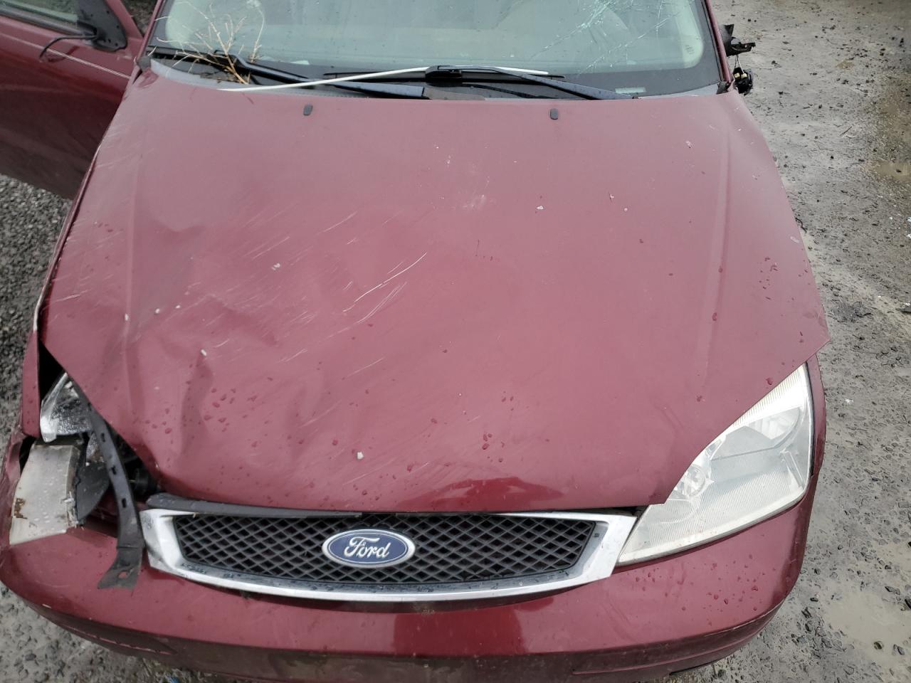 Photo 10 VIN: 1FAFP31N27W346985 - FORD FOCUS 