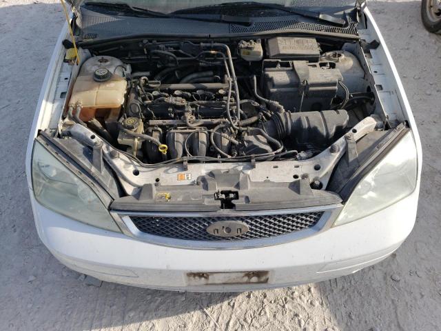 Photo 10 VIN: 1FAFP31N46W161299 - FORD FOCUS ZX3 