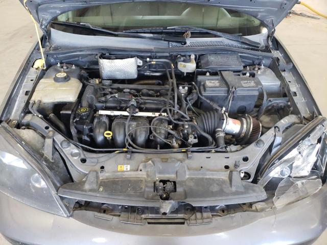 Photo 10 VIN: 1FAFP31N57W157599 - FORD FOCUS 