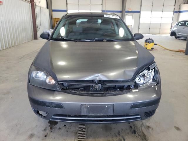 Photo 4 VIN: 1FAFP31N57W157599 - FORD FOCUS 