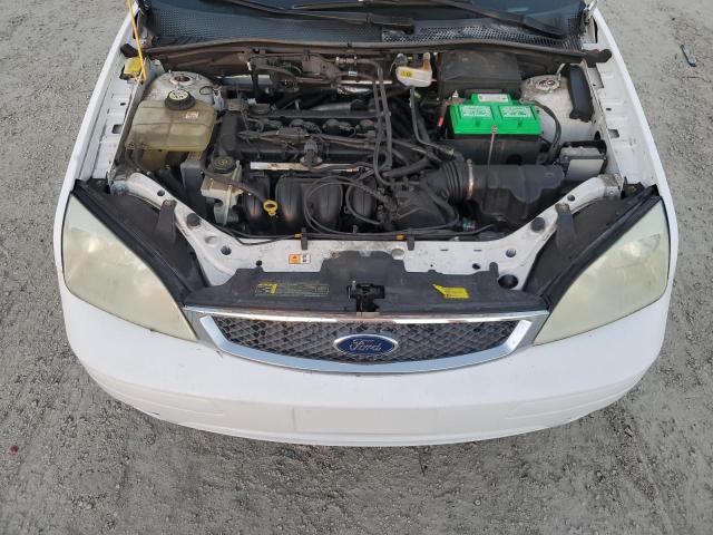 Photo 10 VIN: 1FAFP31N66W153205 - FORD FOCUS ZX3 