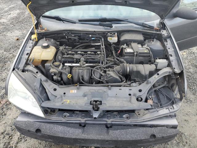 Photo 11 VIN: 1FAFP31N67W118990 - FORD FOCUS ZX3 