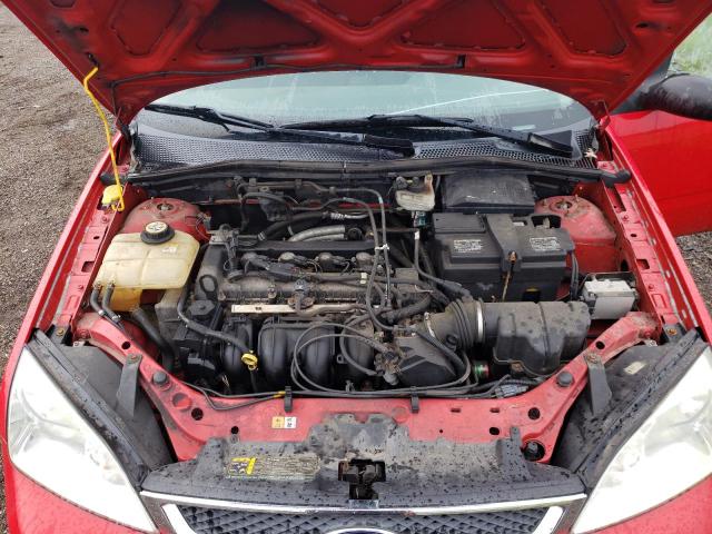 Photo 10 VIN: 1FAFP31N77W334735 - FORD FOCUS ZX3 