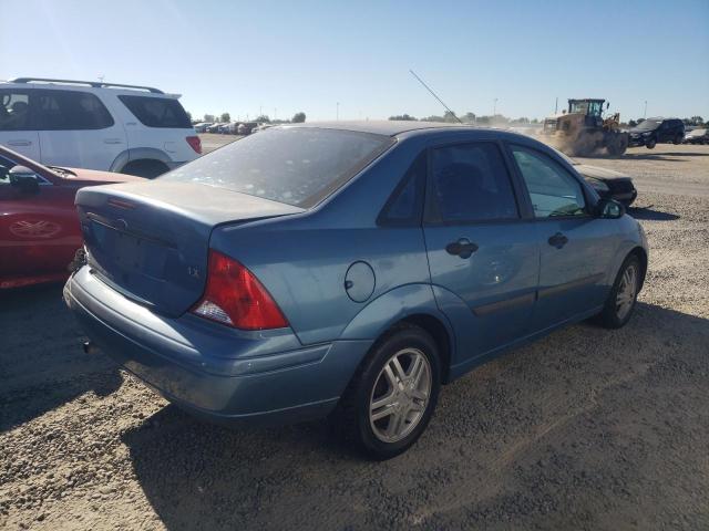 Photo 2 VIN: 1FAFP33P0YW321101 - FORD FOCUS 