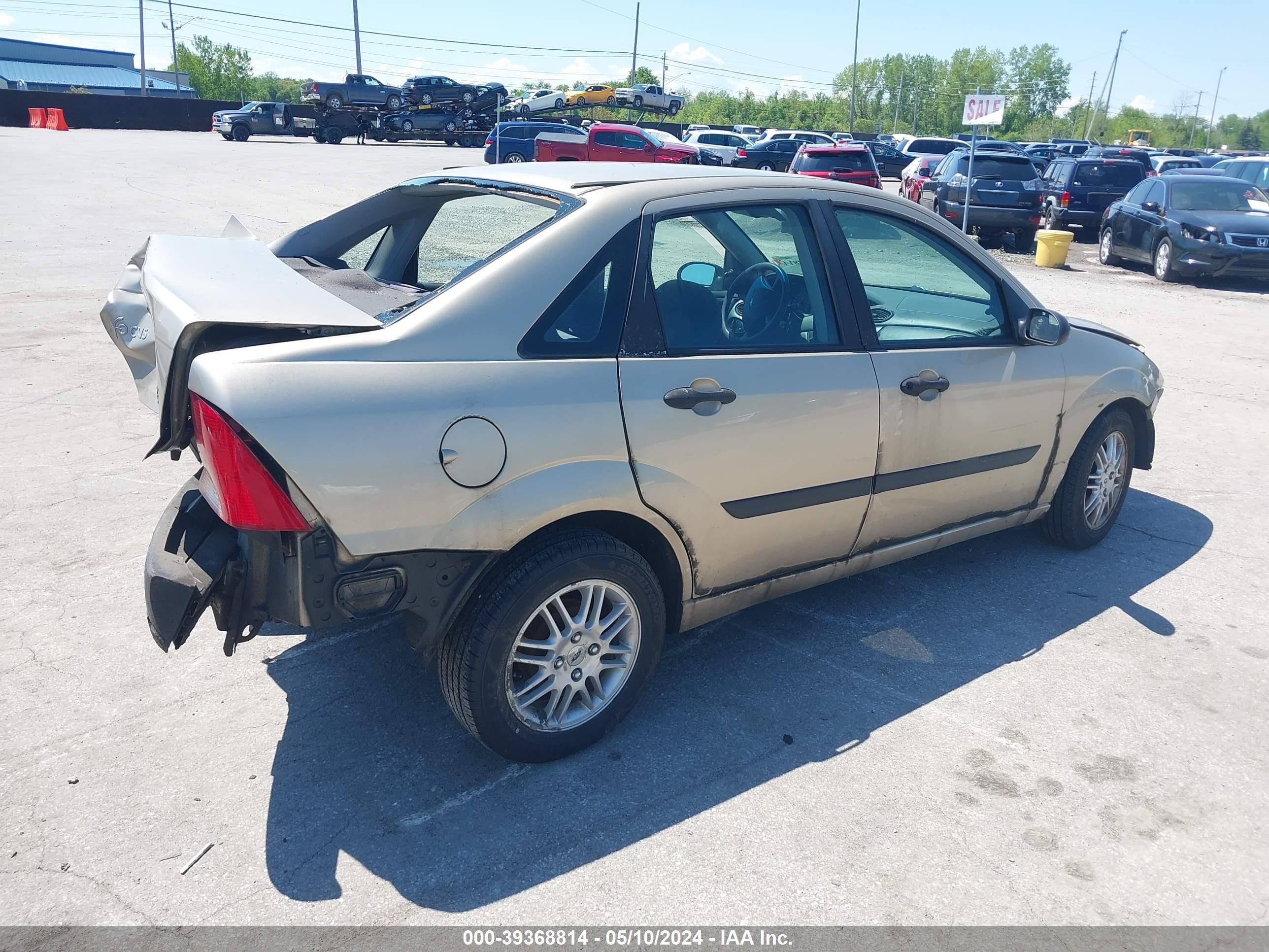 Photo 3 VIN: 1FAFP33P4YW166813 - FORD FOCUS 