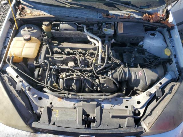 Photo 10 VIN: 1FAFP33Z14W169521 - FORD FOCUS LX 