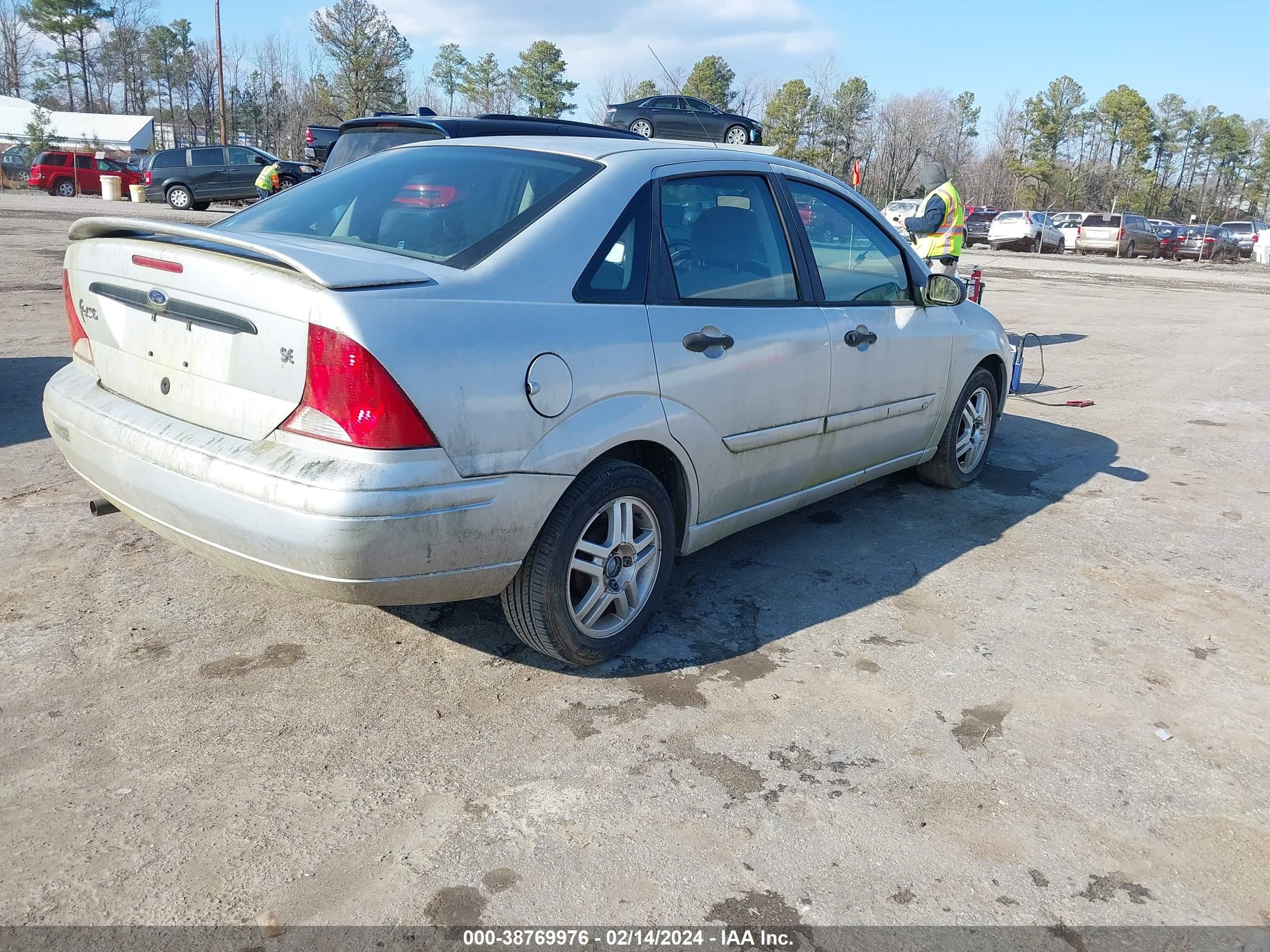 Photo 3 VIN: 1FAFP34301W258101 - FORD FOCUS 