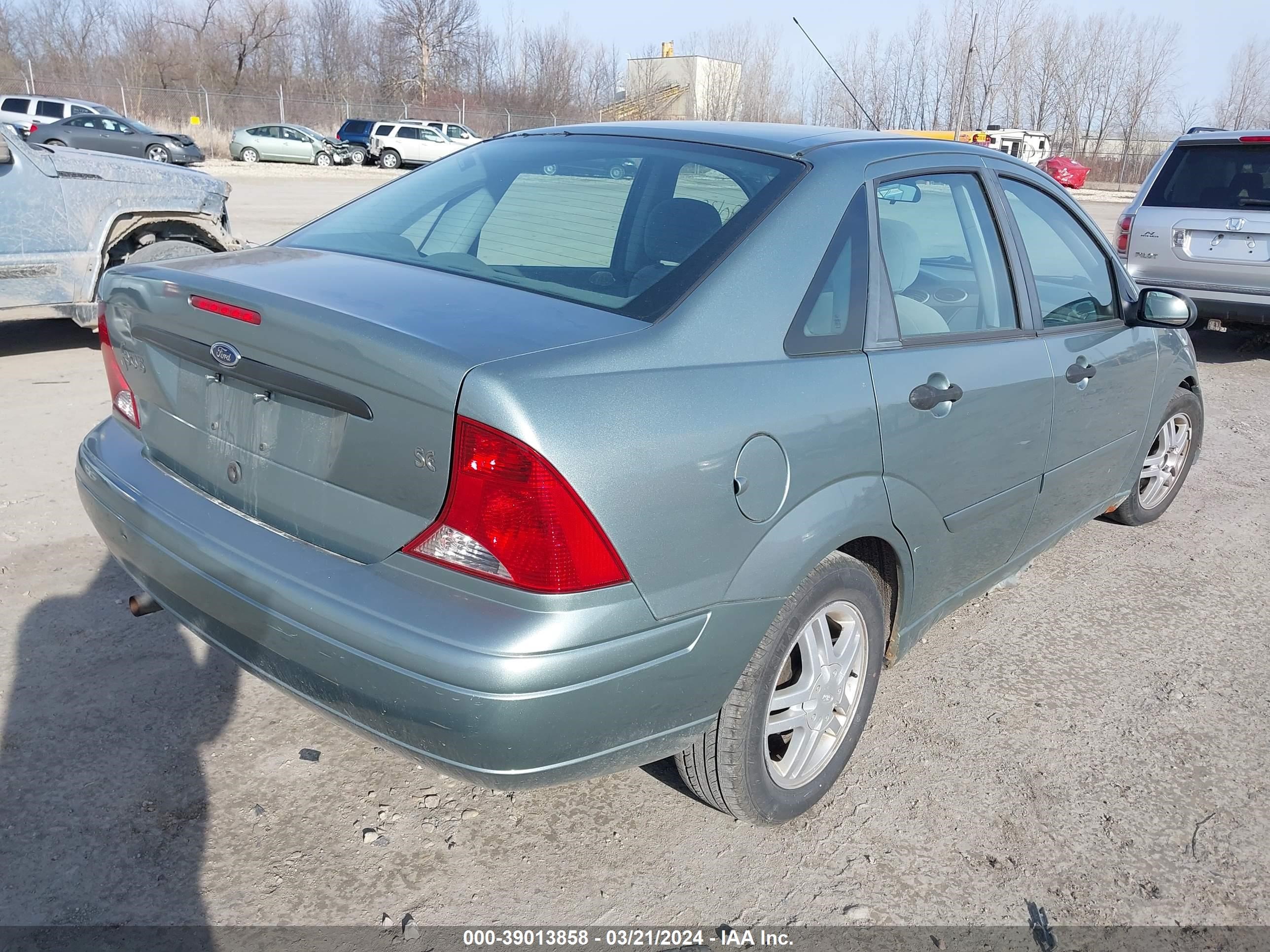 Photo 3 VIN: 1FAFP34313W210450 - FORD FOCUS 