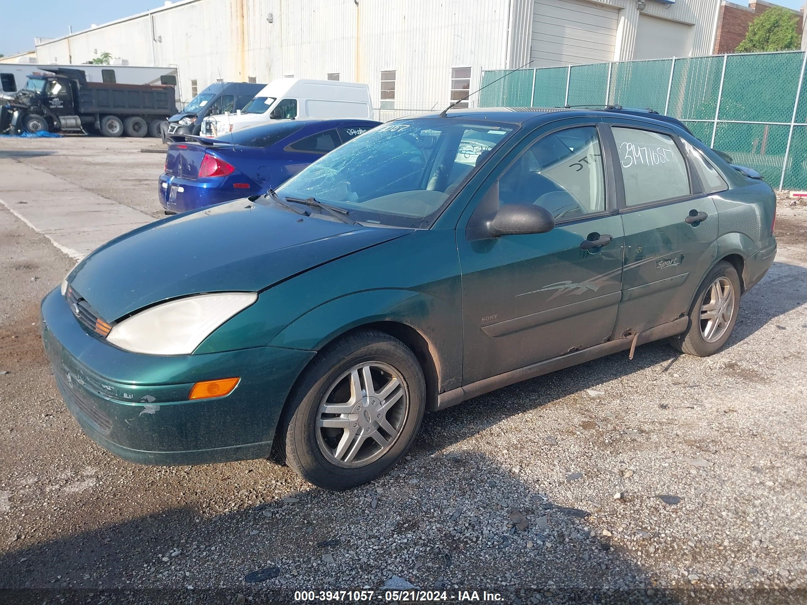 Photo 1 VIN: 1FAFP3431YW273376 - FORD FOCUS 