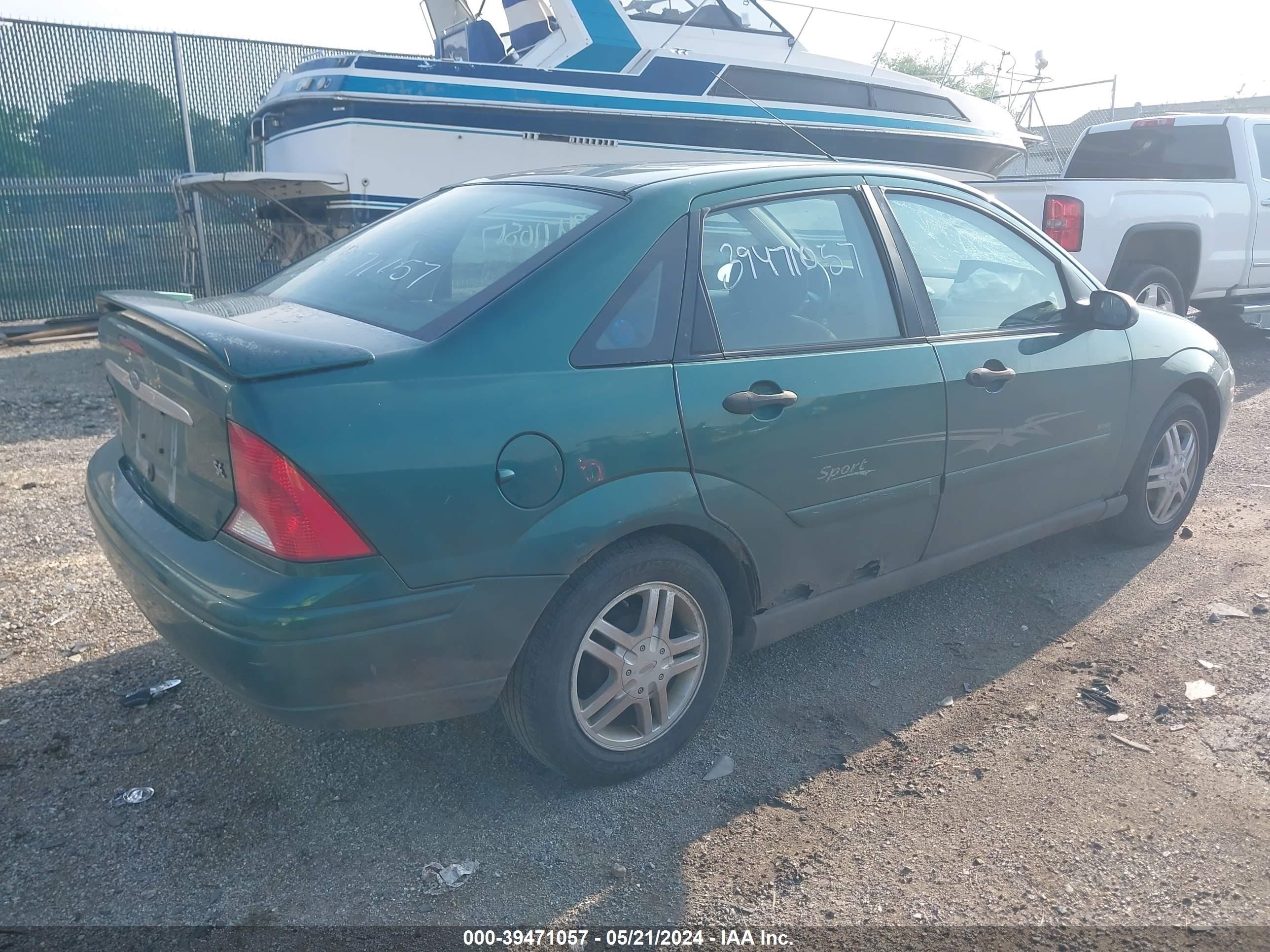 Photo 3 VIN: 1FAFP3431YW273376 - FORD FOCUS 