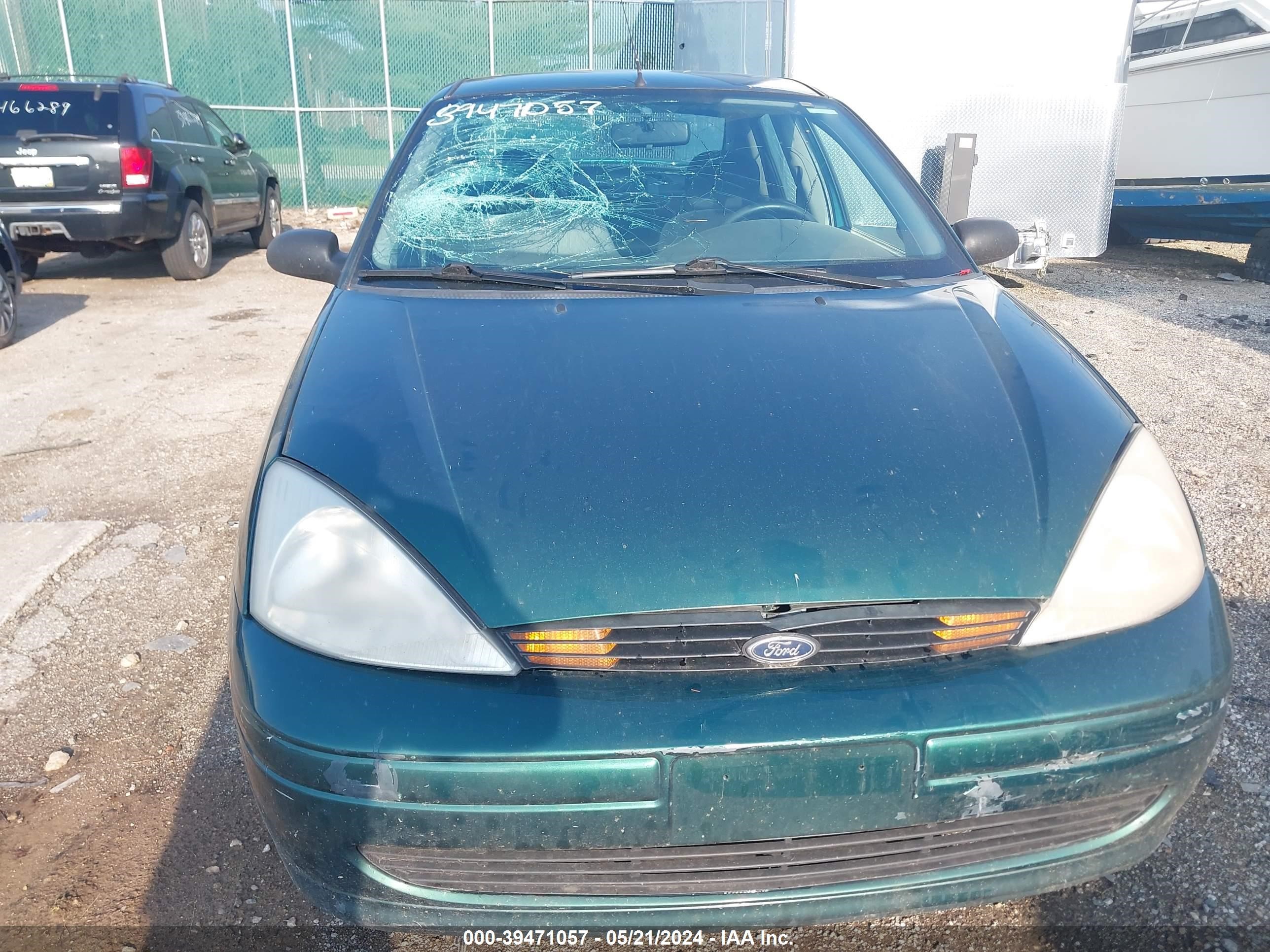 Photo 5 VIN: 1FAFP3431YW273376 - FORD FOCUS 