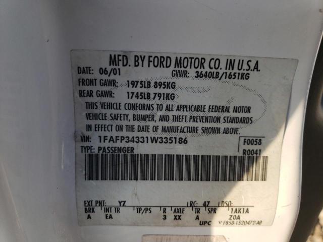 Photo 12 VIN: 1FAFP34331W335186 - FORD FOCUS 