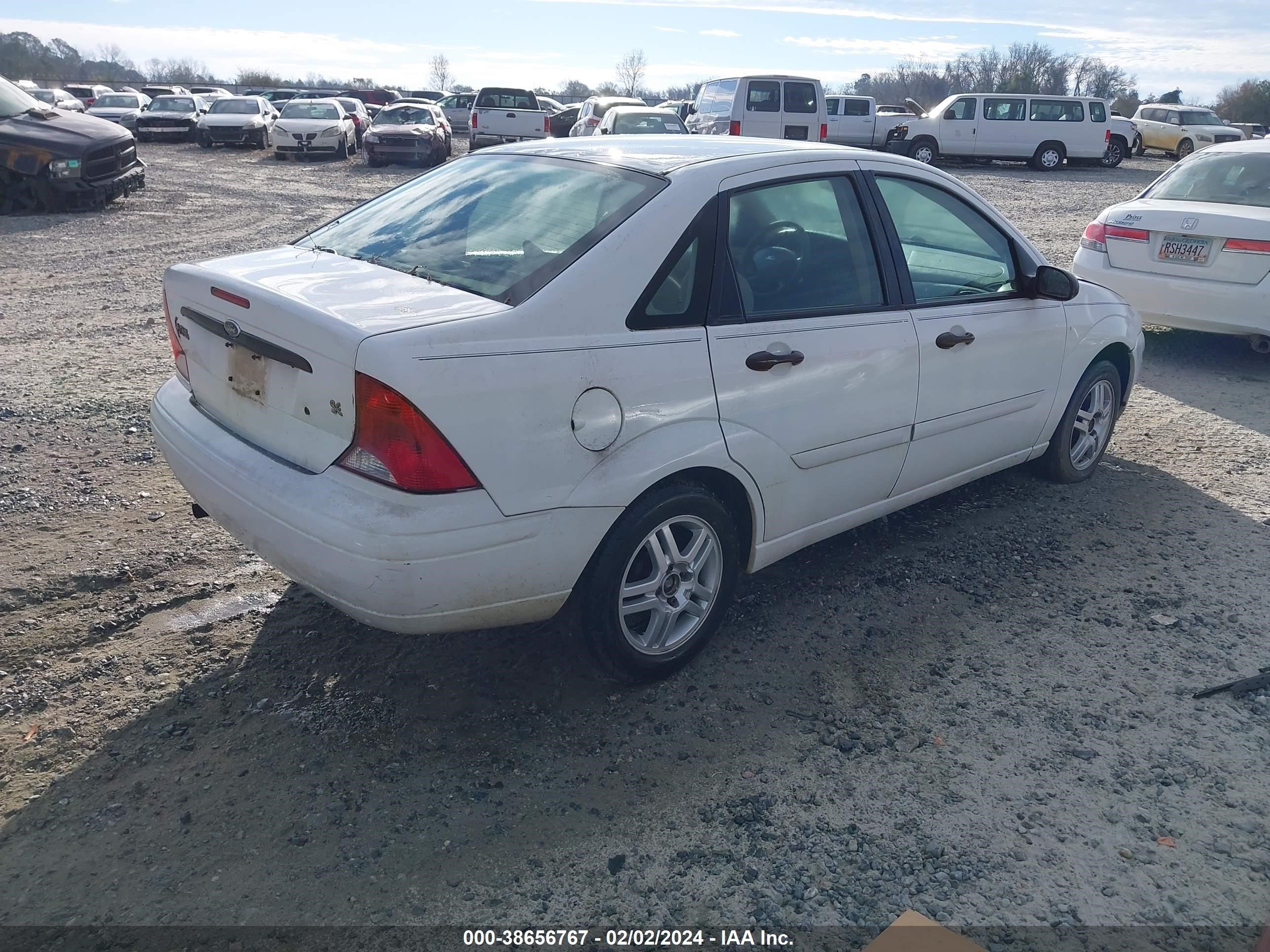 Photo 3 VIN: 1FAFP34364W165197 - FORD FOCUS 