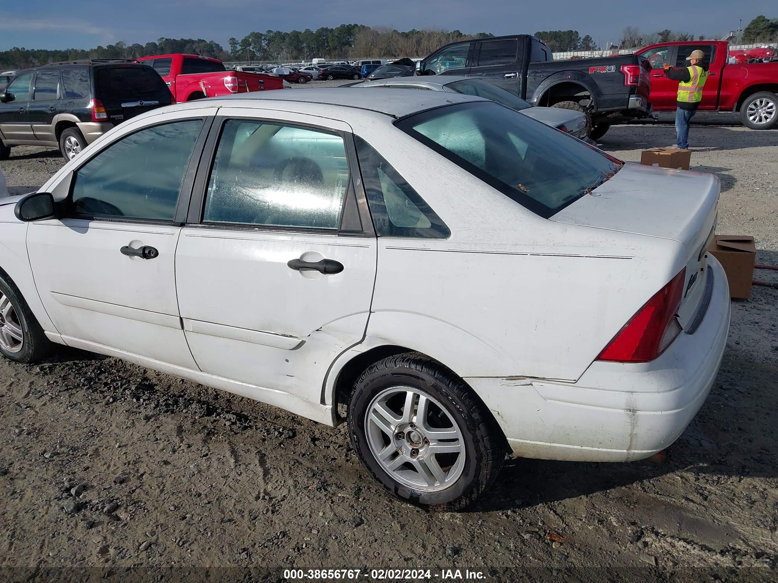 Photo 5 VIN: 1FAFP34364W165197 - FORD FOCUS 