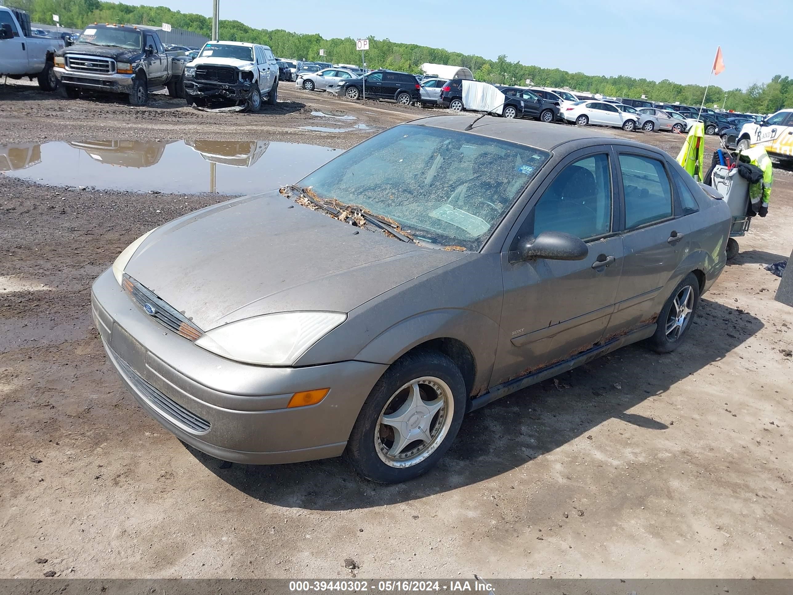 Photo 1 VIN: 1FAFP3436YW297270 - FORD FOCUS 