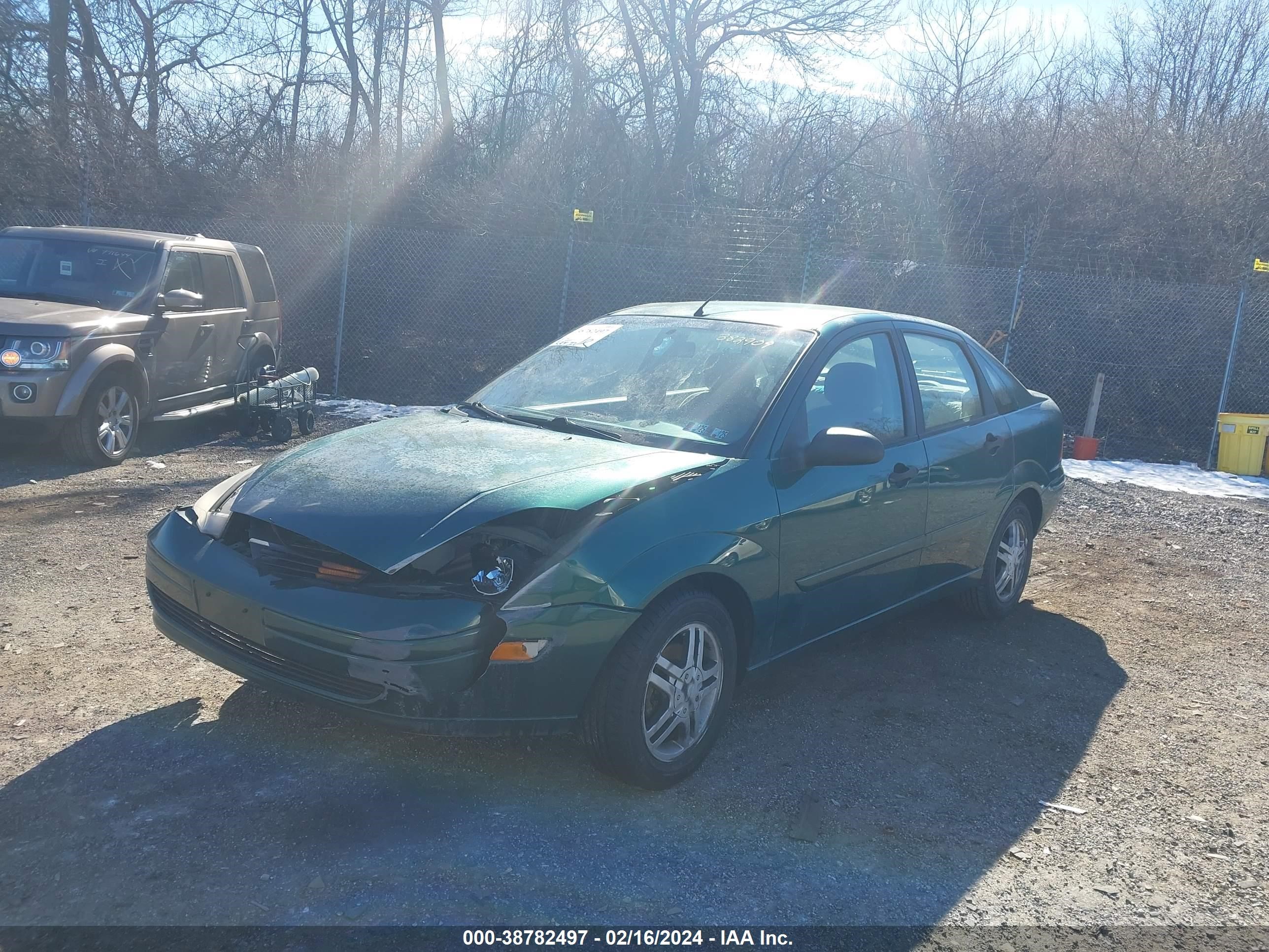 Photo 1 VIN: 1FAFP3437YW382909 - FORD FOCUS 