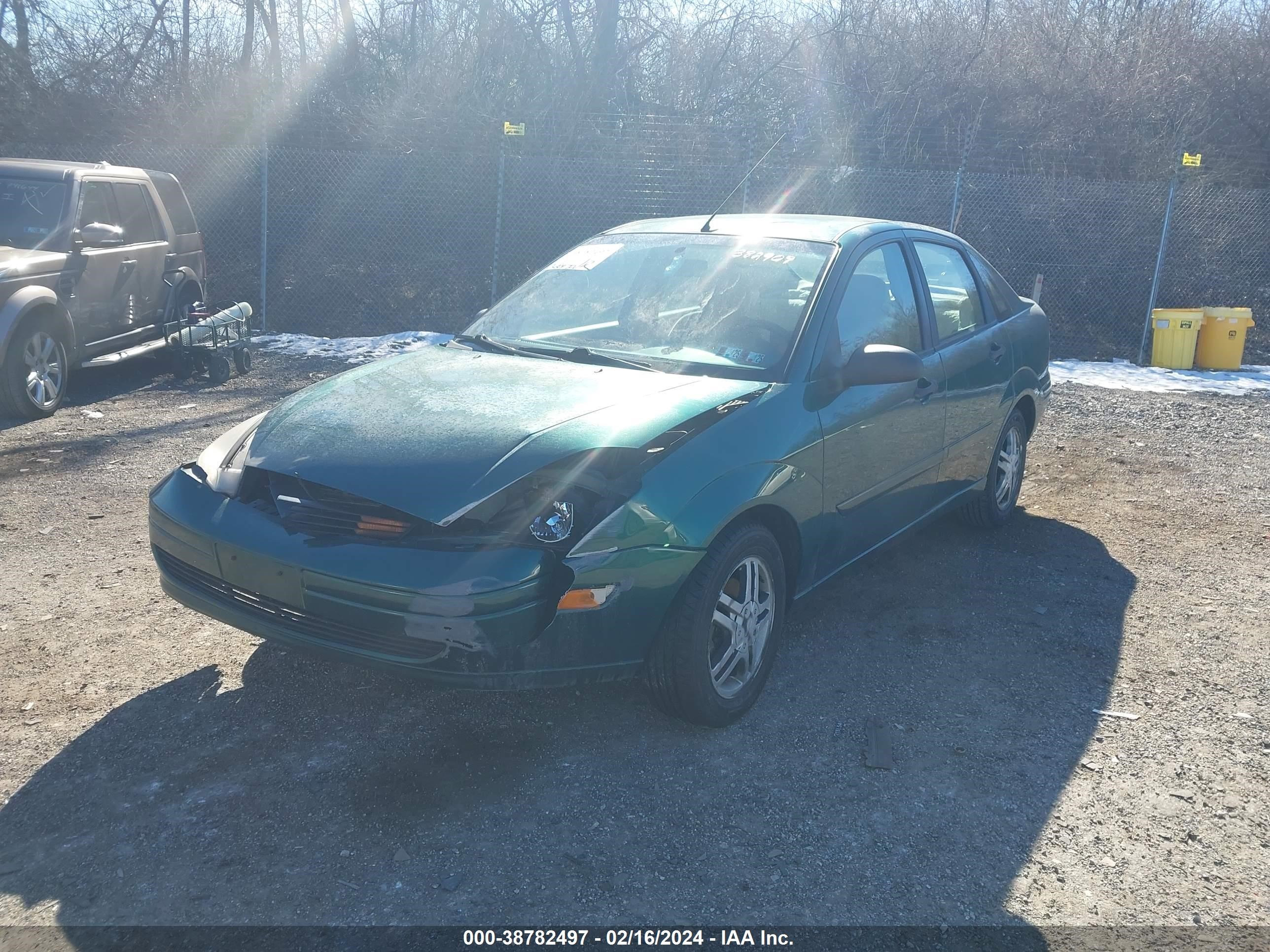 Photo 5 VIN: 1FAFP3437YW382909 - FORD FOCUS 