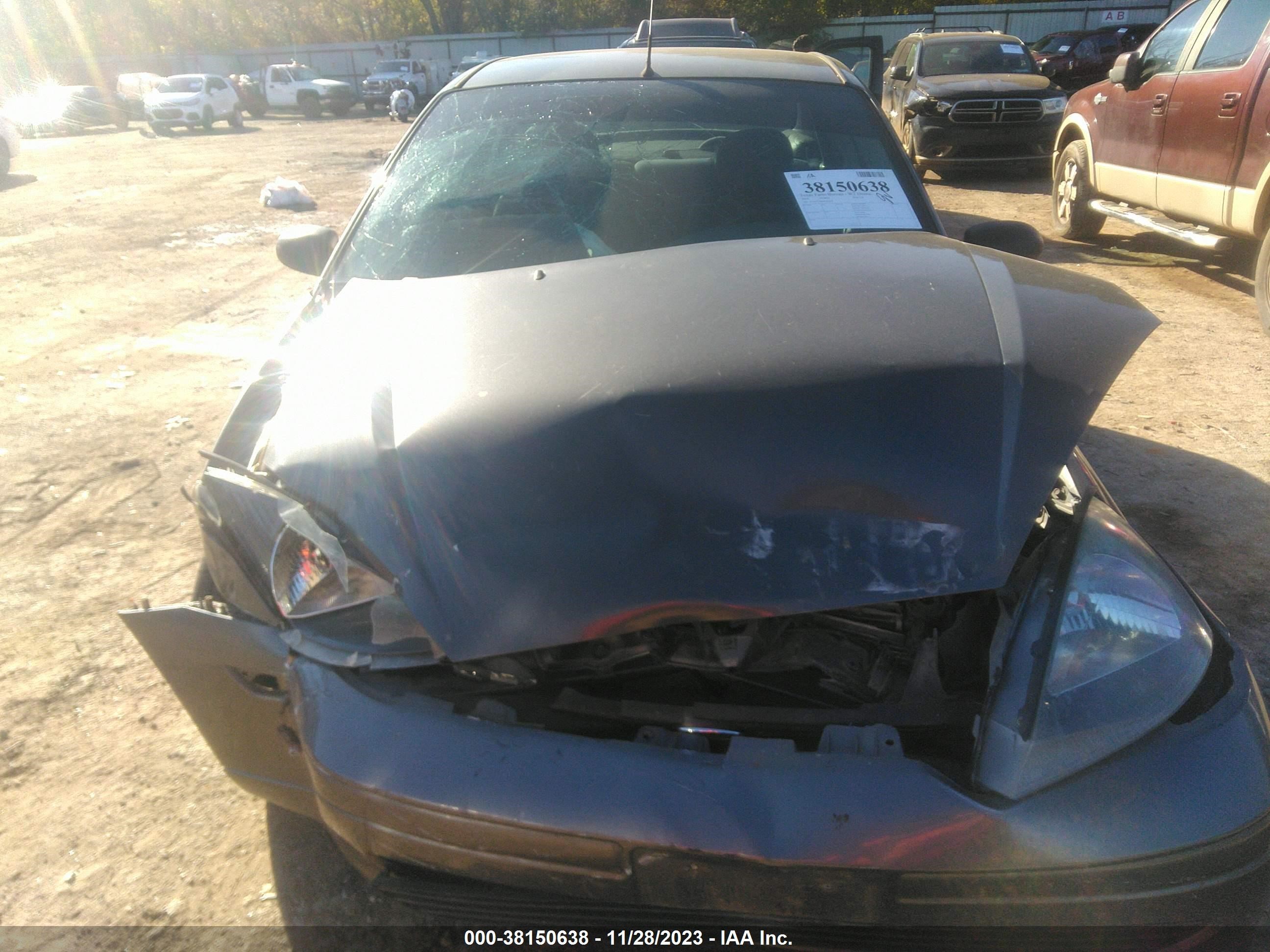 Photo 5 VIN: 1FAFP34384W143458 - FORD FOCUS 