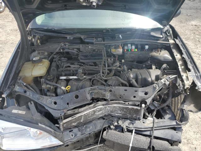 Photo 10 VIN: 1FAFP34N07W152404 - FORD FOCUS 