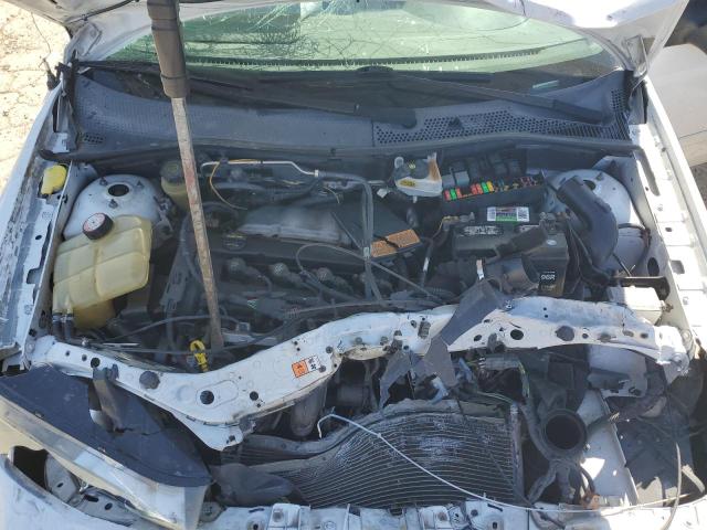 Photo 10 VIN: 1FAFP34N15W123037 - FORD FOCUS ZX4 