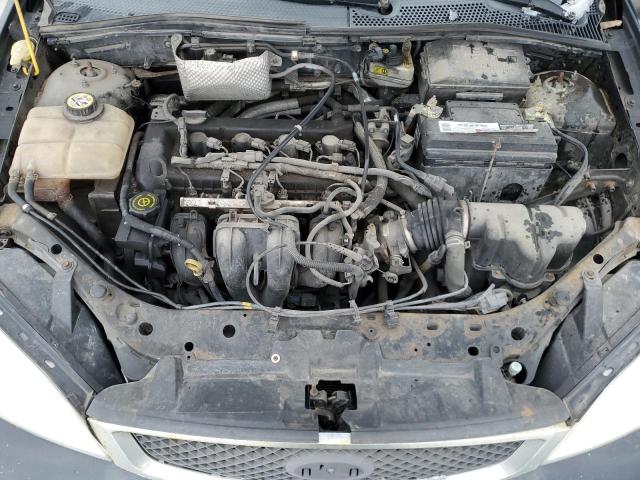 Photo 10 VIN: 1FAFP34N47W297705 - FORD FOCUS 