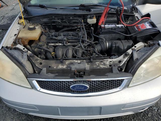 Photo 10 VIN: 1FAFP34N57W143908 - FORD FOCUS ZX4 