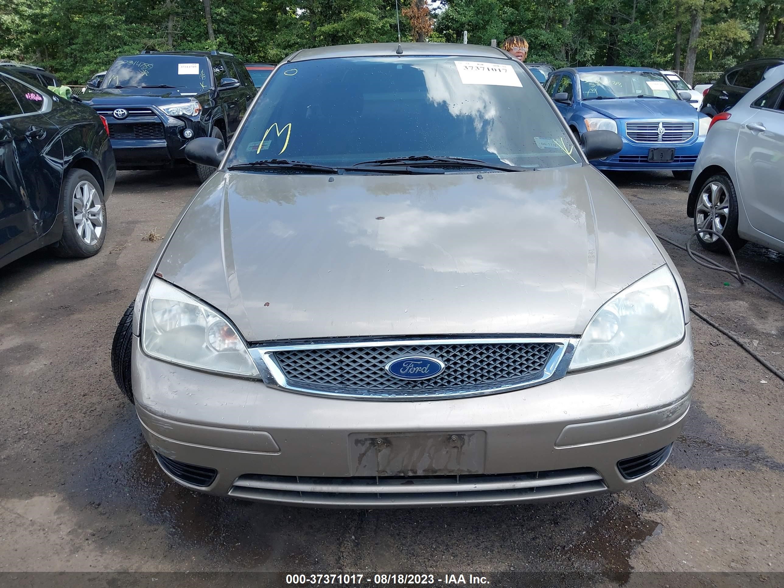 Photo 11 VIN: 1FAFP34N75W163509 - FORD FOCUS 