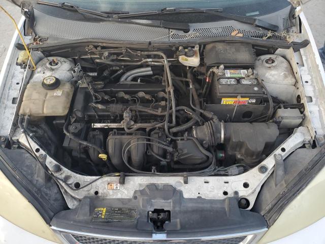 Photo 10 VIN: 1FAFP34N77W164632 - FORD FOCUS ZX4 