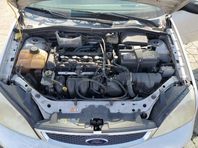 Photo 10 VIN: 1FAFP34N77W322628 - FORD FOCUS ZX4 