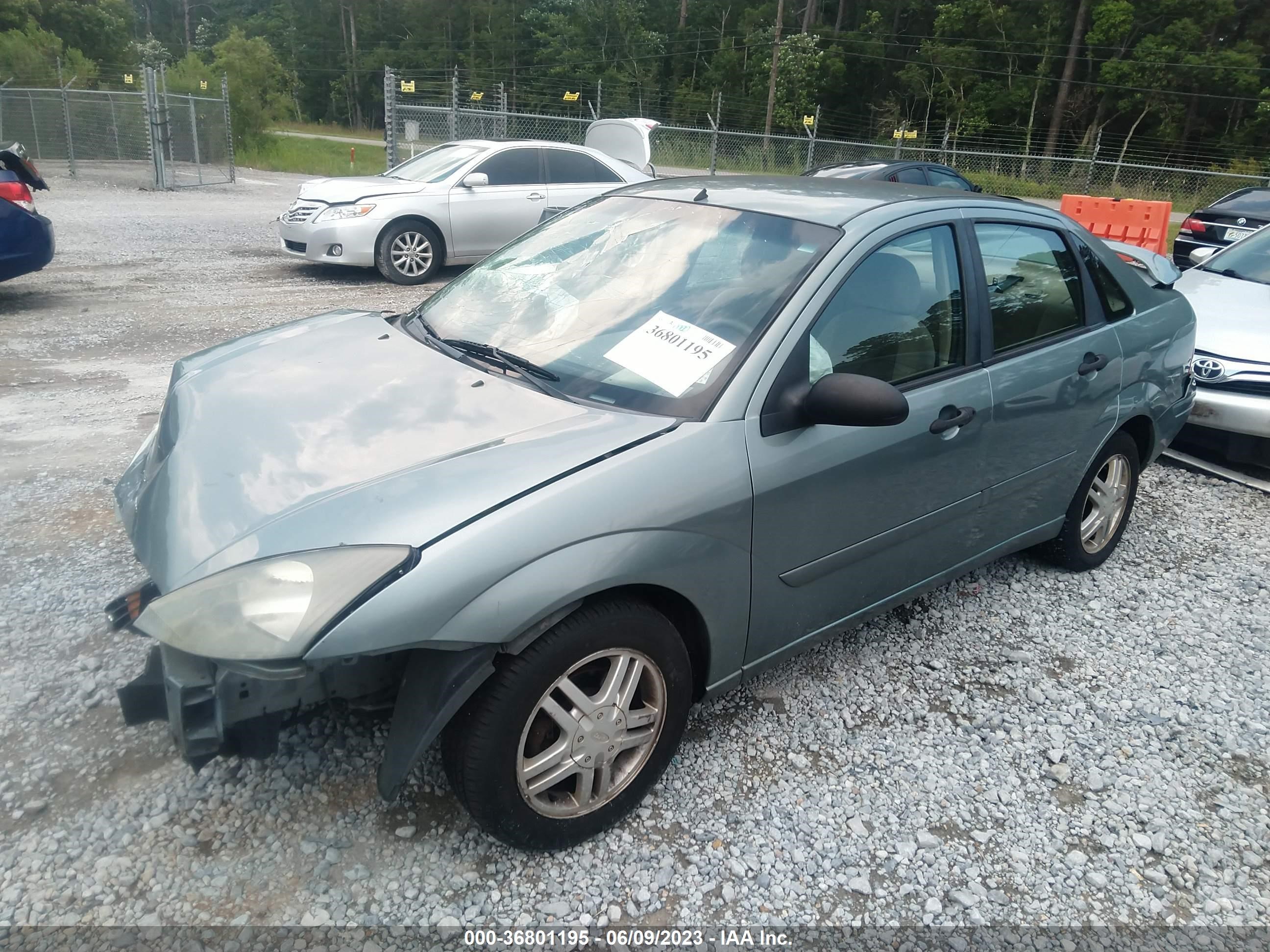 Photo 1 VIN: 1FAFP34P43W147203 - FORD FOCUS 