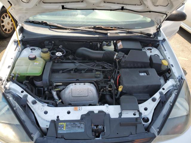 Photo 10 VIN: 1FAFP36303W110482 - FORD FOCUS 