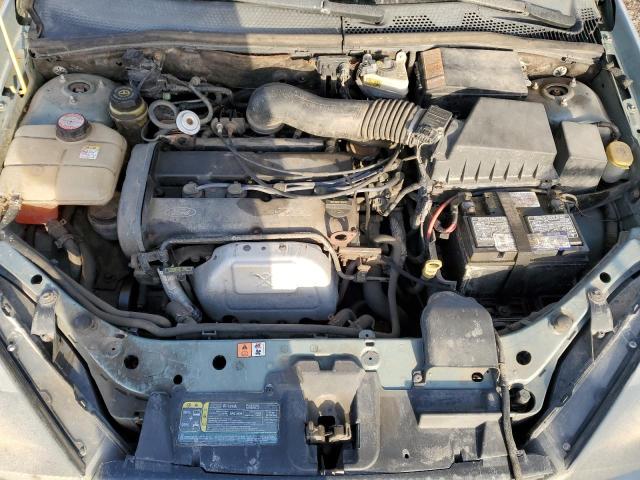 Photo 10 VIN: 1FAFP36393W142301 - FORD FOCUS 