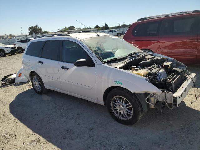 Photo 3 VIN: 1FAFP363X2W265779 - FORD FOCUS SE 