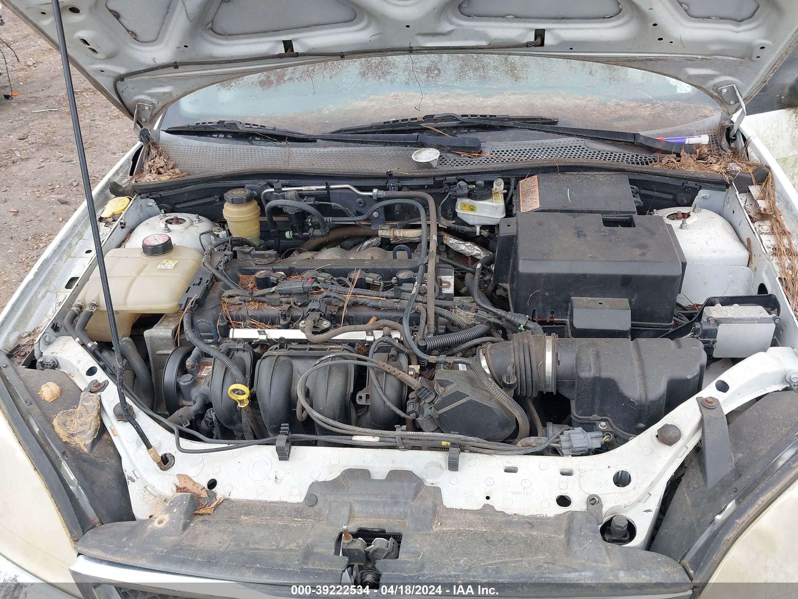 Photo 9 VIN: 1FAFP36N15W135394 - FORD FOCUS 