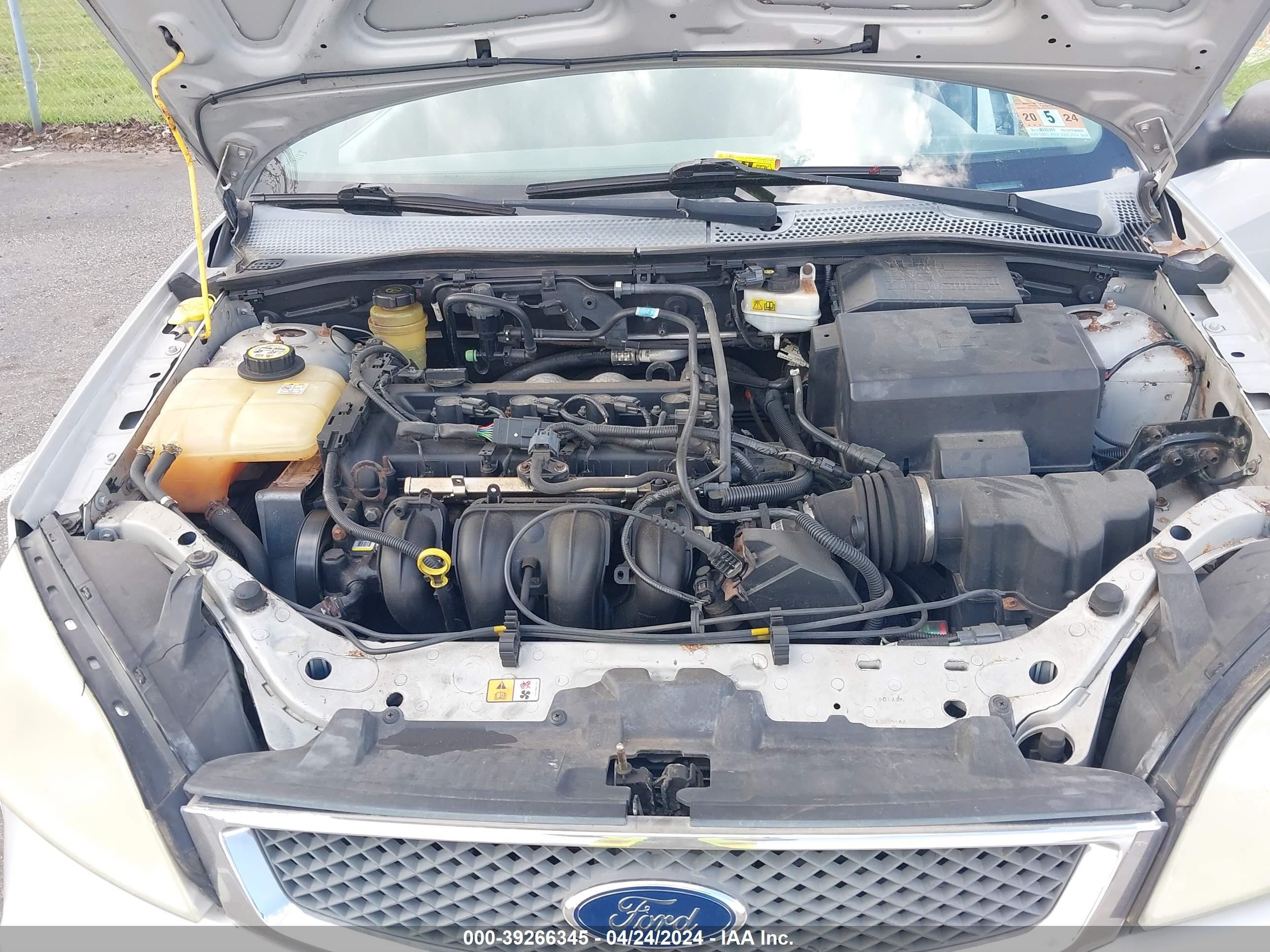 Photo 9 VIN: 1FAFP36N85W287589 - FORD FOCUS 