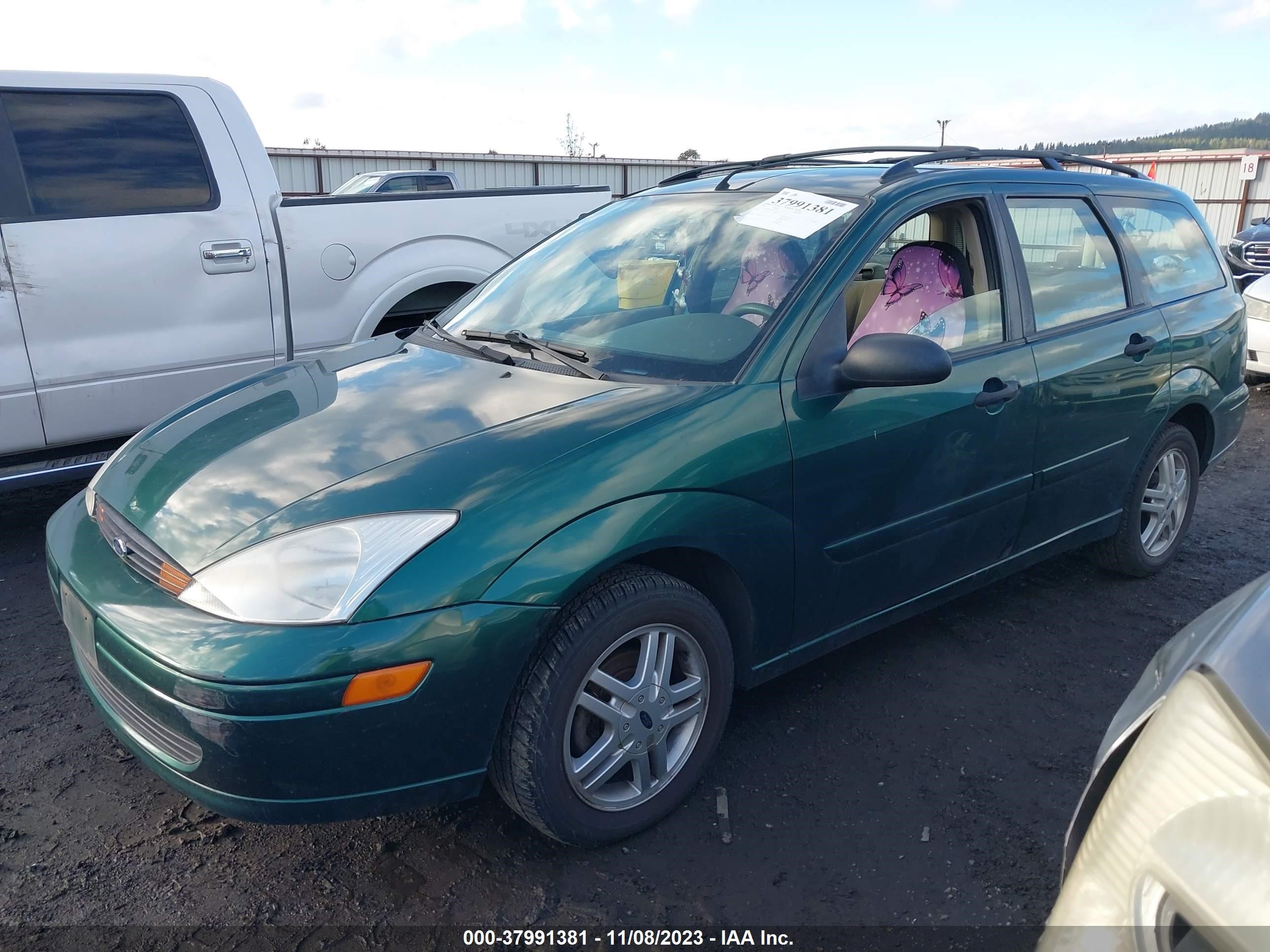 Photo 1 VIN: 1FAFP36P9YW232428 - FORD FOCUS 