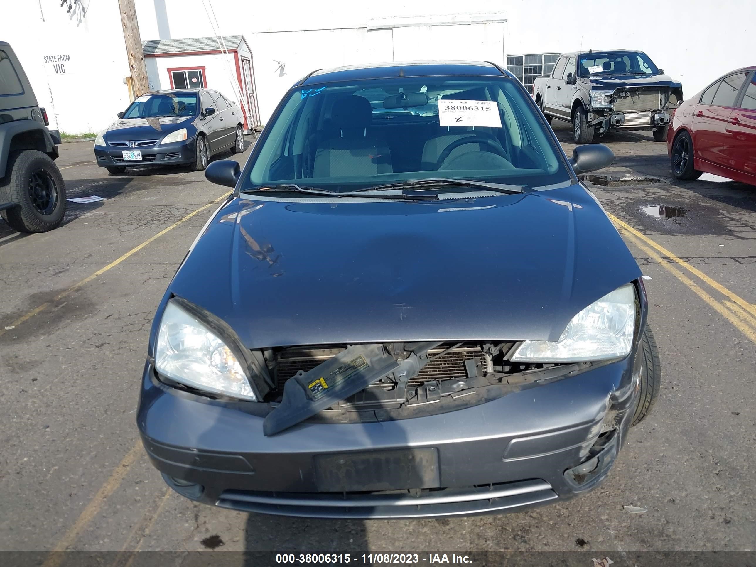 Photo 11 VIN: 1FAFP37N36W165366 - FORD FOCUS 