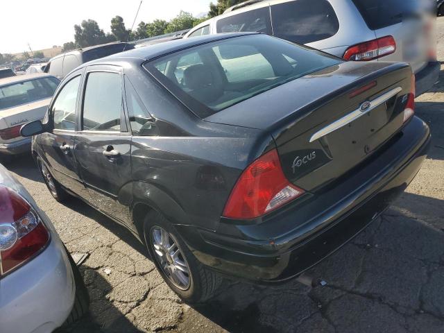 Photo 1 VIN: 1FAFP3835YW407090 - FORD FOCUS 