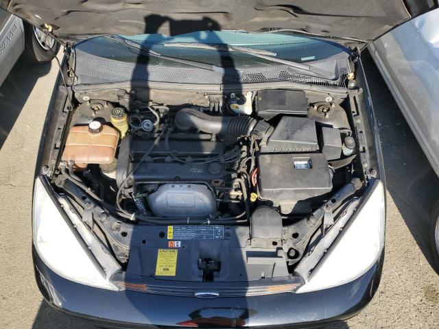 Photo 10 VIN: 1FAFP3835YW407090 - FORD FOCUS 